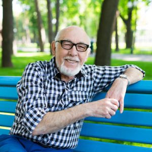 gentleman-on-bright-blue-bench-sq-400